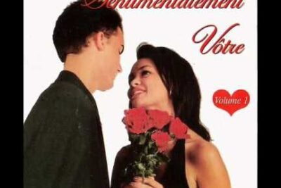 Couple gazing at each other while the woman holds a bouquet of red roses on a white album-style background with French lettering and 16 ans 6