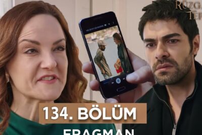 Two intense faces flank a hand holding a smartphone displaying a video still, creating a tense promotional scene — a beskytte 2
