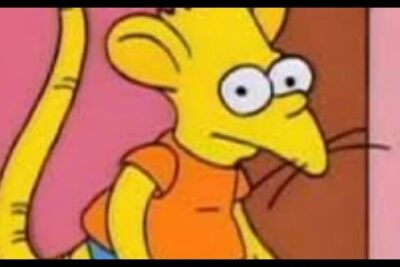 Yellow cartoon mouse-like character in an orange shirt, a royke 1