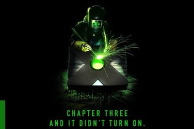 Welder working on a black Xbox console with vivid green sparks and circuit-board glow, aben grusgrav minedrift 1.