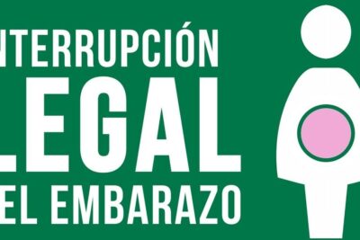 Green poster with large white text 'Interrupción Legal del Embarazo' and a simplified white pregnant figure with a pink circular belly, aborto legal 25.