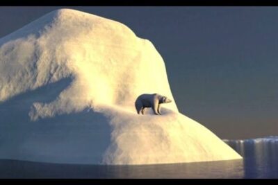 A solitary polar bear stands on a small snow-covered iceberg at dusk, evoking aussterben bedroht.