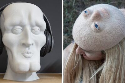 White sculpted mannequin head wearing black over-ear headphones next to a person wearing a handmade felt hat shaped like a face, comprar internet 2