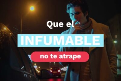 Man smoking beside a parked car at night depicting consumo tabaco 1