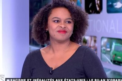 Woman in a television studio appearing in a debat racisme segment