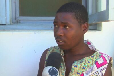 Young interviewee speaking into a broadcast microphone, delinquencia juvenil 2