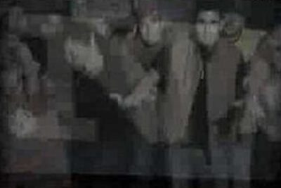 Grainy black-and-white image of a crowd dancing in motion det u00e4r 1