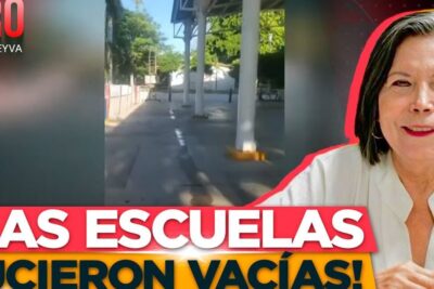 Empty outdoor school corridor with white columns, paved yard and a portrait overlay highlighting educacion publica 9