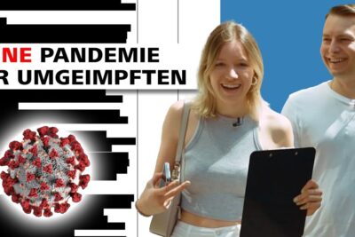 Two smiling young adults holding a clipboard in front of a bold graphic poster with a virus illustration, einige menschen 2.