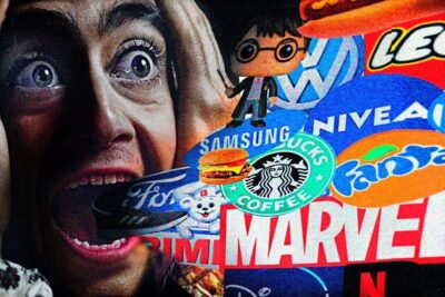 A wide-eyed person clutching their face while colorful brand logos flood their open mouth, illustrating el consumismo 1.