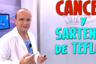 Presenter in white coat beside a whiteboard showing 'CANCER' and 'SARTENES DE TEFLÓN' discussing el teflon 1.