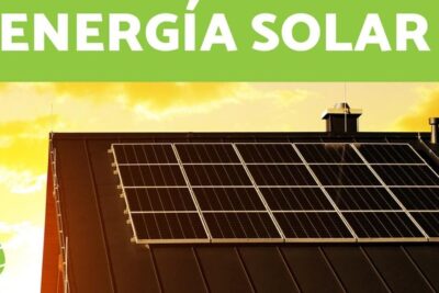 Roof-mounted photovoltaic solar panels under a warm yellow sky highlighting energia solar 10