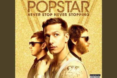 Gold-toned pop music poster of three performers arranged back-to-back conveying equal rights and unity.