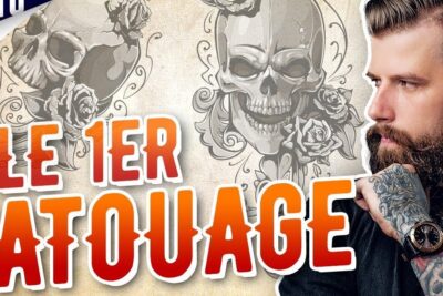 Bearded man with sleeve tattoos and skull illustrations considering where to faire tatouer.