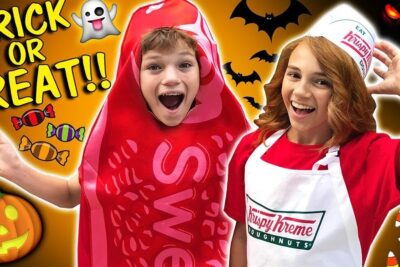 Two kids in a Krispy Kreme-style uniform and a red candy costume ready for fejre halloween