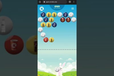 Mobile bubble shooter screen with a cartoon bunny and colorful product bubbles for miljon 1.