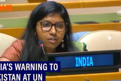 Woman speaking at a UN desk labeled INDIA about strategies for terrorism prevention.