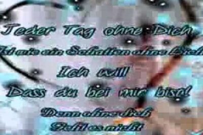 Blurry blue romantic graphic featuring a heart, sparkles and German script overlay labeled gef hle 1.