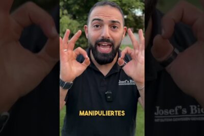 Bearded man making emphatic OK hand gestures outdoors with genetisk manipulation 2