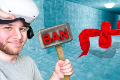 Man wearing a VR headset holds a hammer labeled BAN while facing a floating red creature in an icy hallway, gmo iden