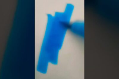 Vivid blue marker block on white paper suggesting graffitien arvoa.