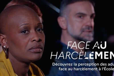 Close-up of two concerned adults in a discussion about harcelement scolaire 3.
