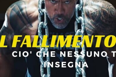 A tattooed, muscular man training with heavy chains and intense focus in a poster labeled il fallimento 1.