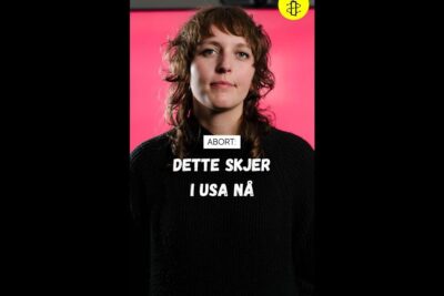 Portrait of a person against a pink backdrop with a bold 'Abort' headline and imot abort messaging.