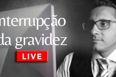 Professional-looking man at a computer during a live session about interrupcao gravidez 1