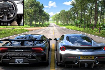 Two supercars side by side on a sunlit tree-lined road with a racing wheel inset, jeux video 2.
