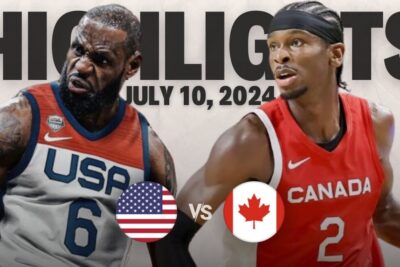 Two basketball players facing off in USA and Canada jerseys in a kanada yhdysvallat game