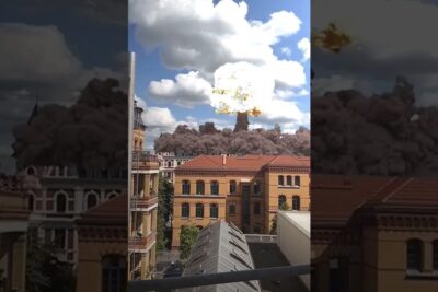 Augmented reality mushroom cloud explosion over city rooftops using karnkraft ar 1