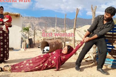 Man pulling a woman across dusty ground as another woman holds a baby, labeled 'first woman' and 'second wife', klerens interesser 1