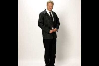 Full-length studio portrait of a formally dressed man on white background for kunstig befruktning related articles