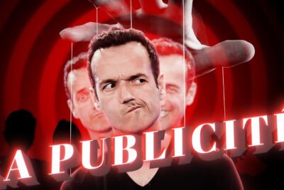 Man depicted as a puppet beneath a large hand with bold la publicite text and red concentric target background