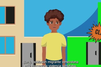 Illustrated young migrant standing between buildings with Spanish subtitles about la xenofobia 1.