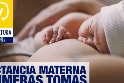 Newborn breastfeeding with a gentle hand on the chest, lactancia materna 1.