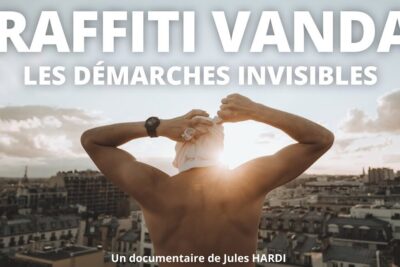 Shirtless person on a rooftop tying a headscarf at sunset suggesting le graffiti street art culture.