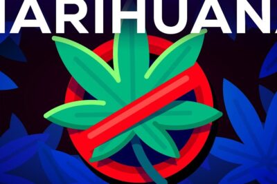 Stylized cannabis leaf crossed by a red prohibition symbol with bold MARIHUANA text, legalizacion marihuana 33