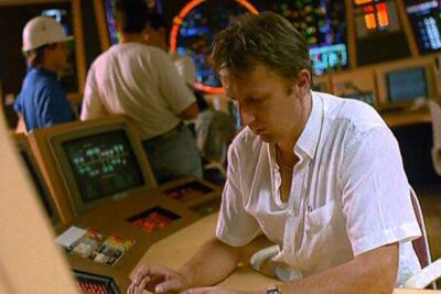 Operator at a control console monitoring instrumentation in a nuclear control room lenergie nucleaire 1.