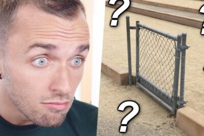 Man with a shocked expression looking at a tiny, misplaced chain-link gate highlighting les erreurs in design