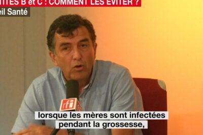 Man speaking into a microphone during a radio health segment about lhepatite b and pregnancy