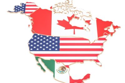 Map of North America overlaid with United States, Canadian and Mexican flags representing libre comercio 2.