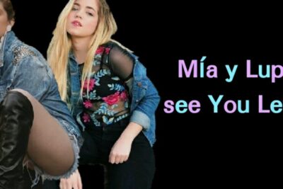 Two women in denim jackets and a floral sheer top pose against a black backdrop with pastel gradient text promoting livet vira.