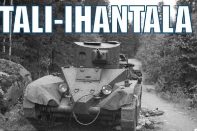 Black-and-white image of a vintage armored vehicle on a forest road with bold TALI-IHANTALA text, luotettavia lahteita
