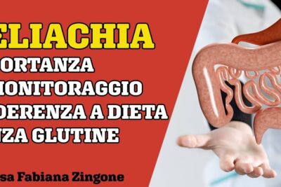 3D model of intestines above a medical professional's hand illustrating malattia celiaca and the need for gluten-free diet adherence