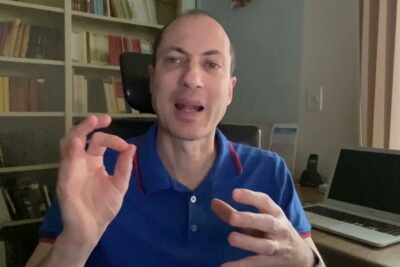 Man in a home office speaking directly to camera about o condiloma and genital warts