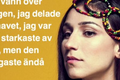 Close-up portrait of a woman wearing colorful beaded hair rings on a yellow background, pa jorden 11