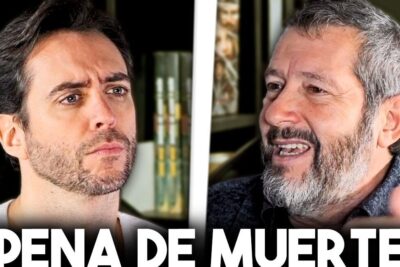 Two men in a split-screen exchange appearing to debate the issue pena muerte 31.
