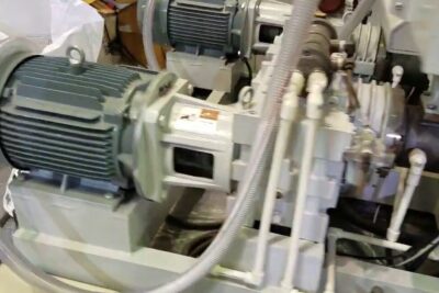 Electric motor and pump assembly used in plast ar production machinery.